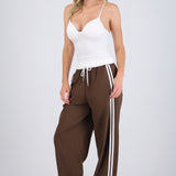 Pantalones pretina contraste con rayas al costado