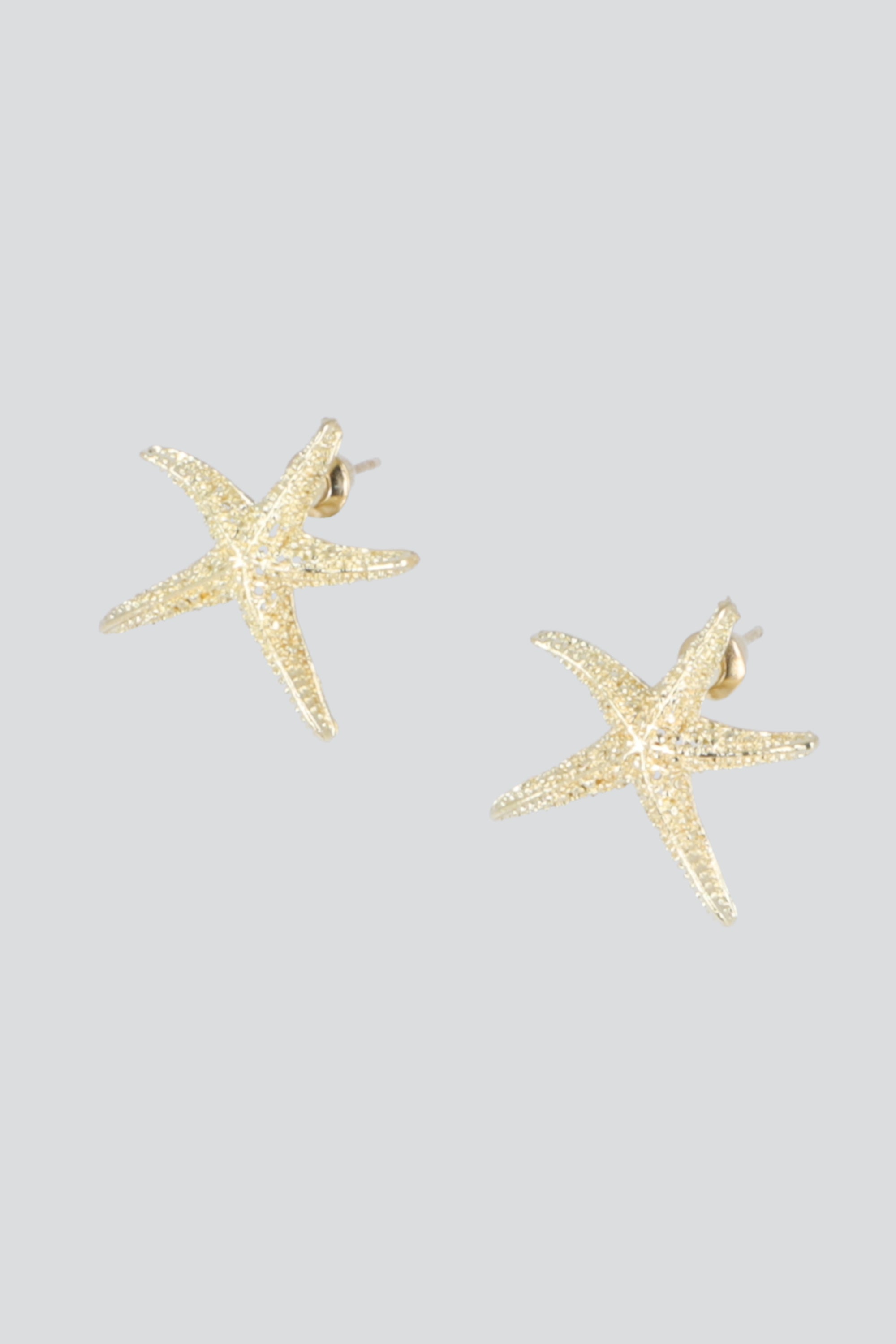ARETES ESTRELLA DE MAR METAL ORO