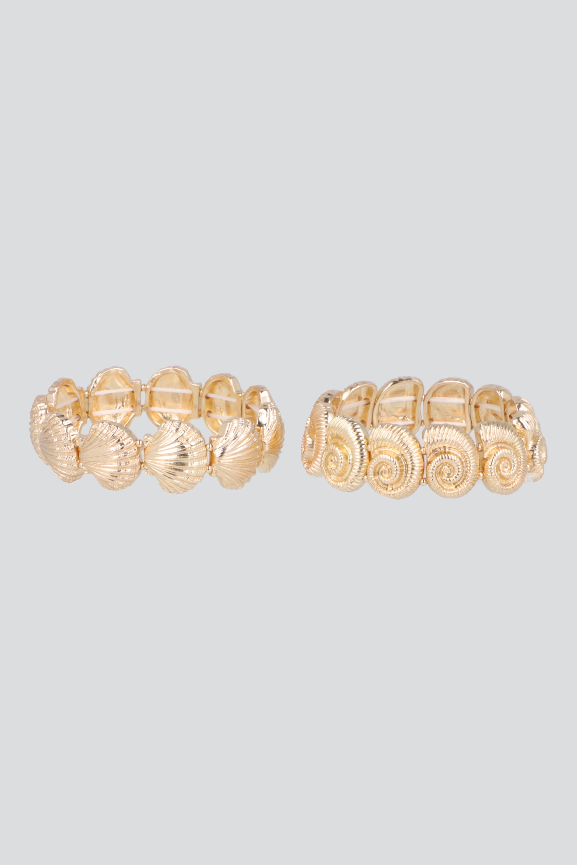 2 P CUFFS MULTICONCHAS ORO