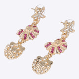 Aretes triple conchas mix