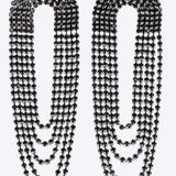 Aretes alargados brillos