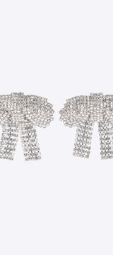 Aretes moños maxi brillos
