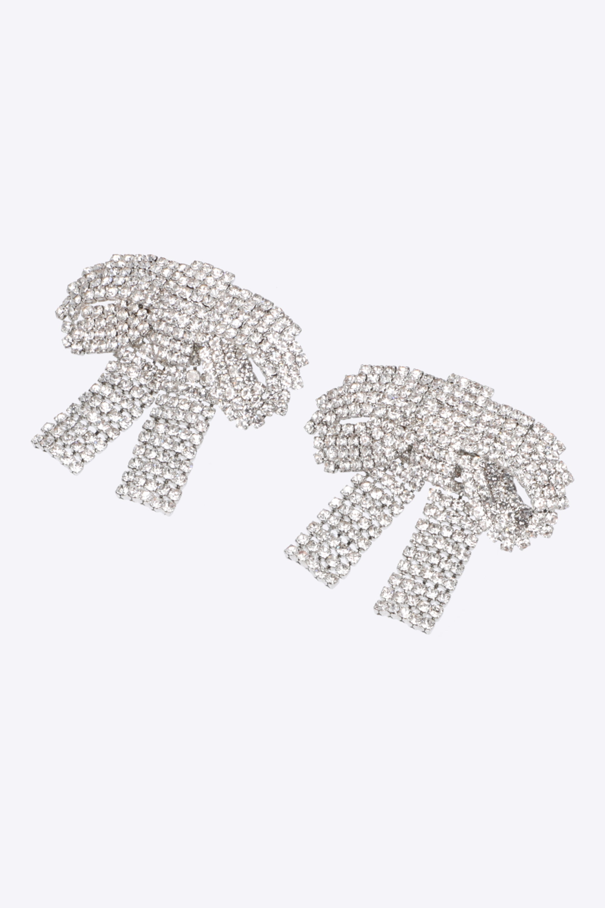 Aretes moños maxi brillos