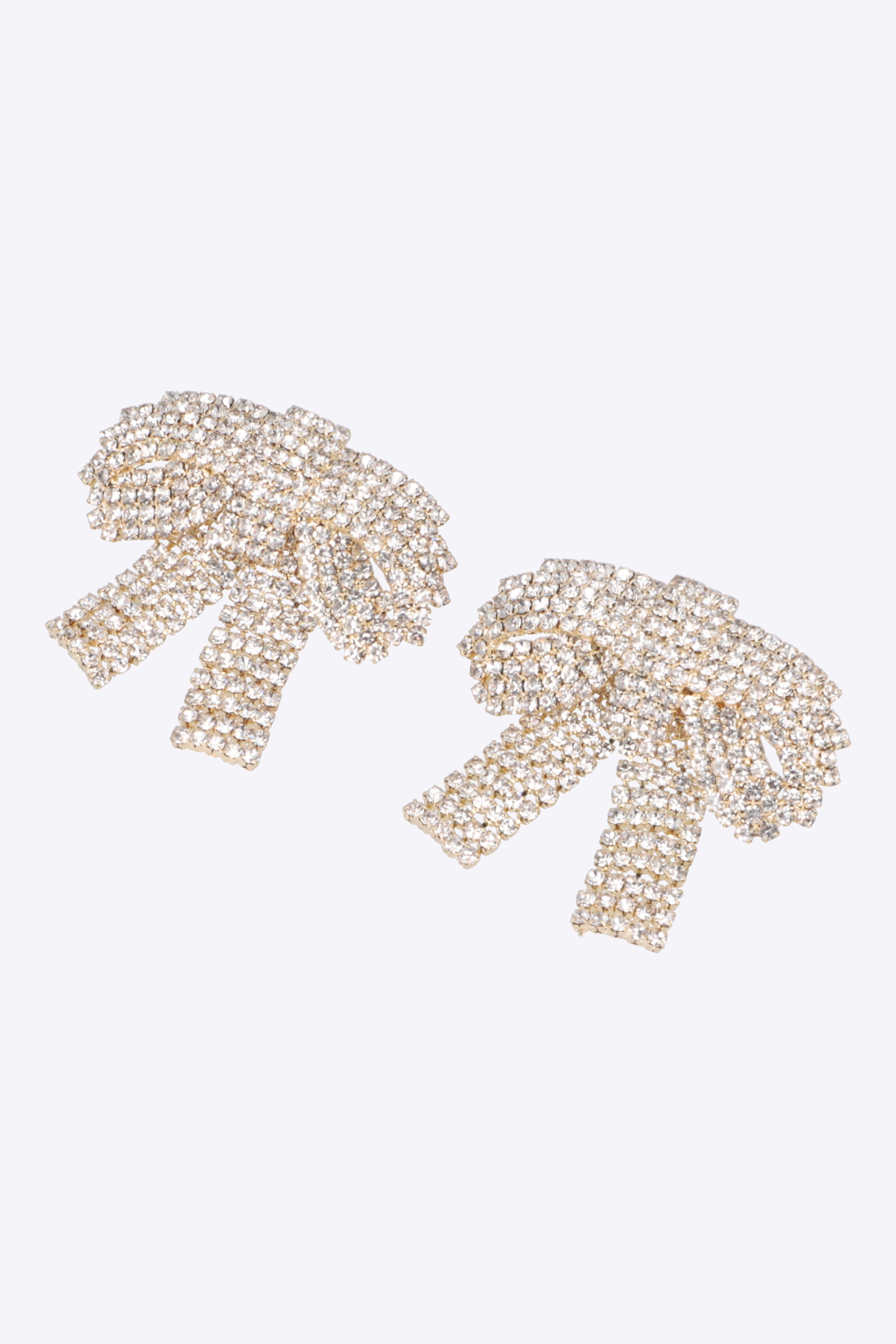 Aretes moños maxi brillos