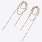 Aretes brillos envolventes