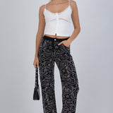 Jeans straight flores brillos