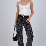 Jeans straight flores brillos
