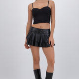 Falda olanes efecto piel detalle eyelets