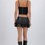 Falda olanes efecto piel detalle eyelets