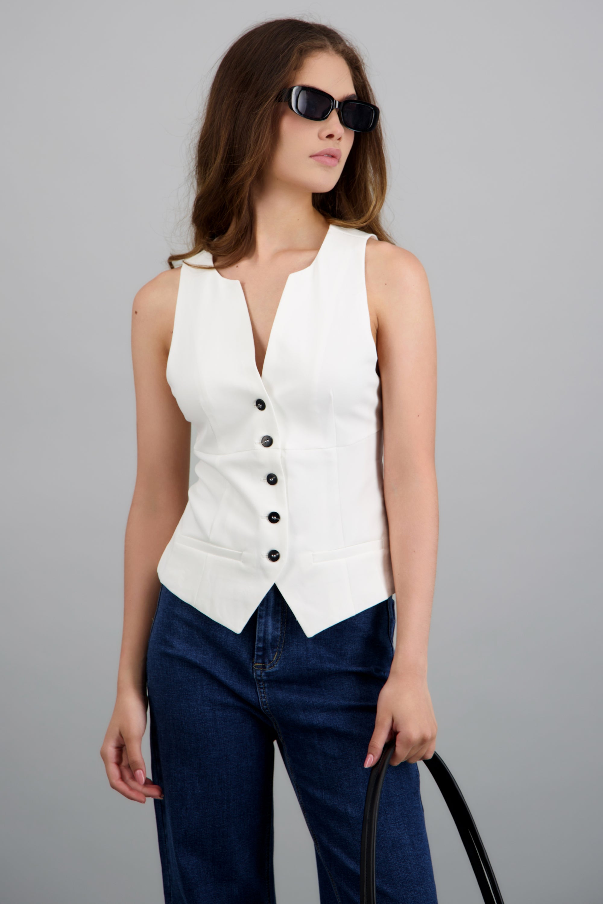 Chaleco detalle cortes escote en v BLANCO