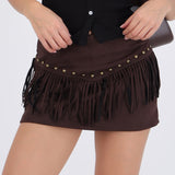 Falda short gamuza flecos con estoperoles