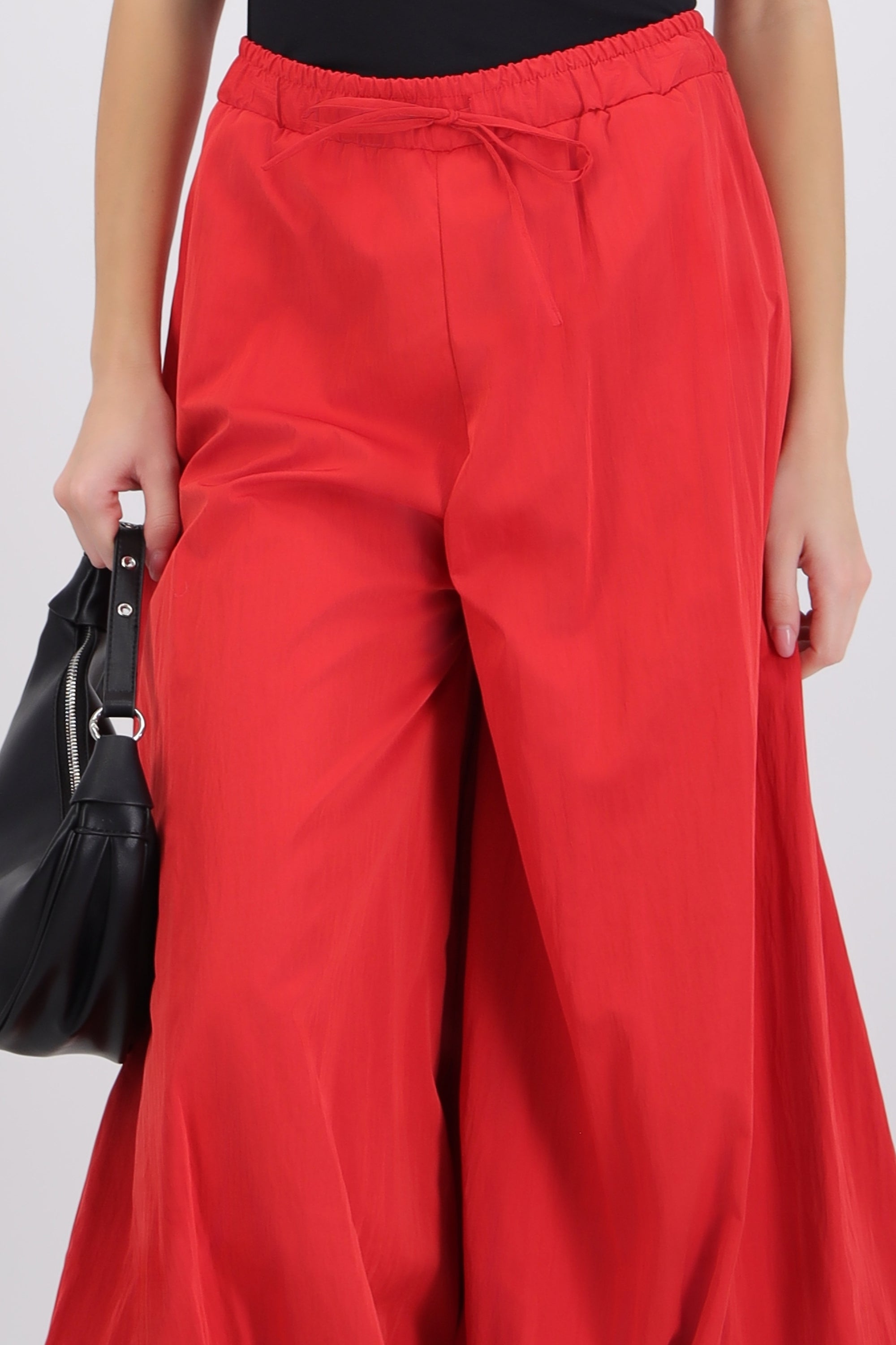Pantalones globo detalle pretina ajustable