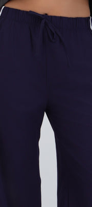 Pantalón amplio contraste linea costado