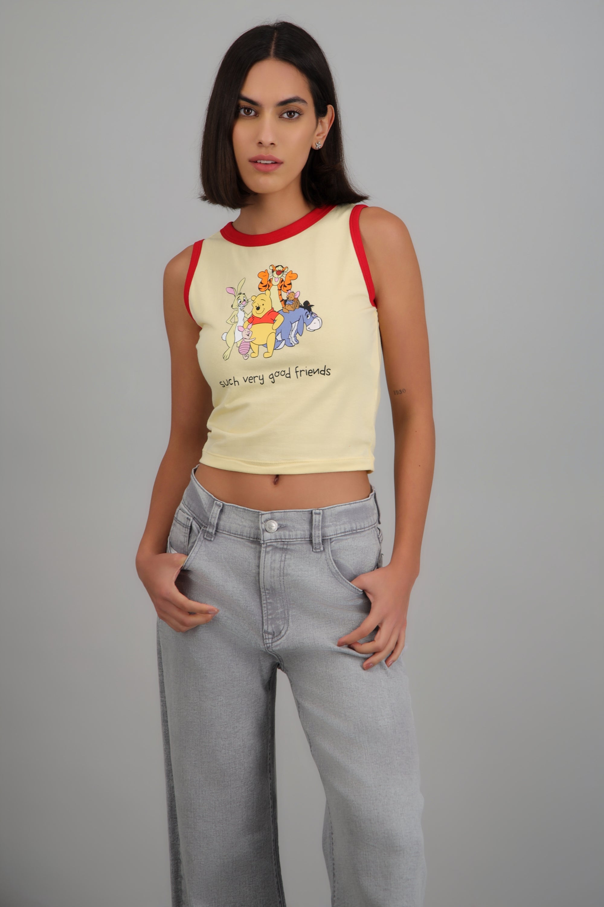 Crop sin manga Winnie Pooh AMARILLO PASTEL