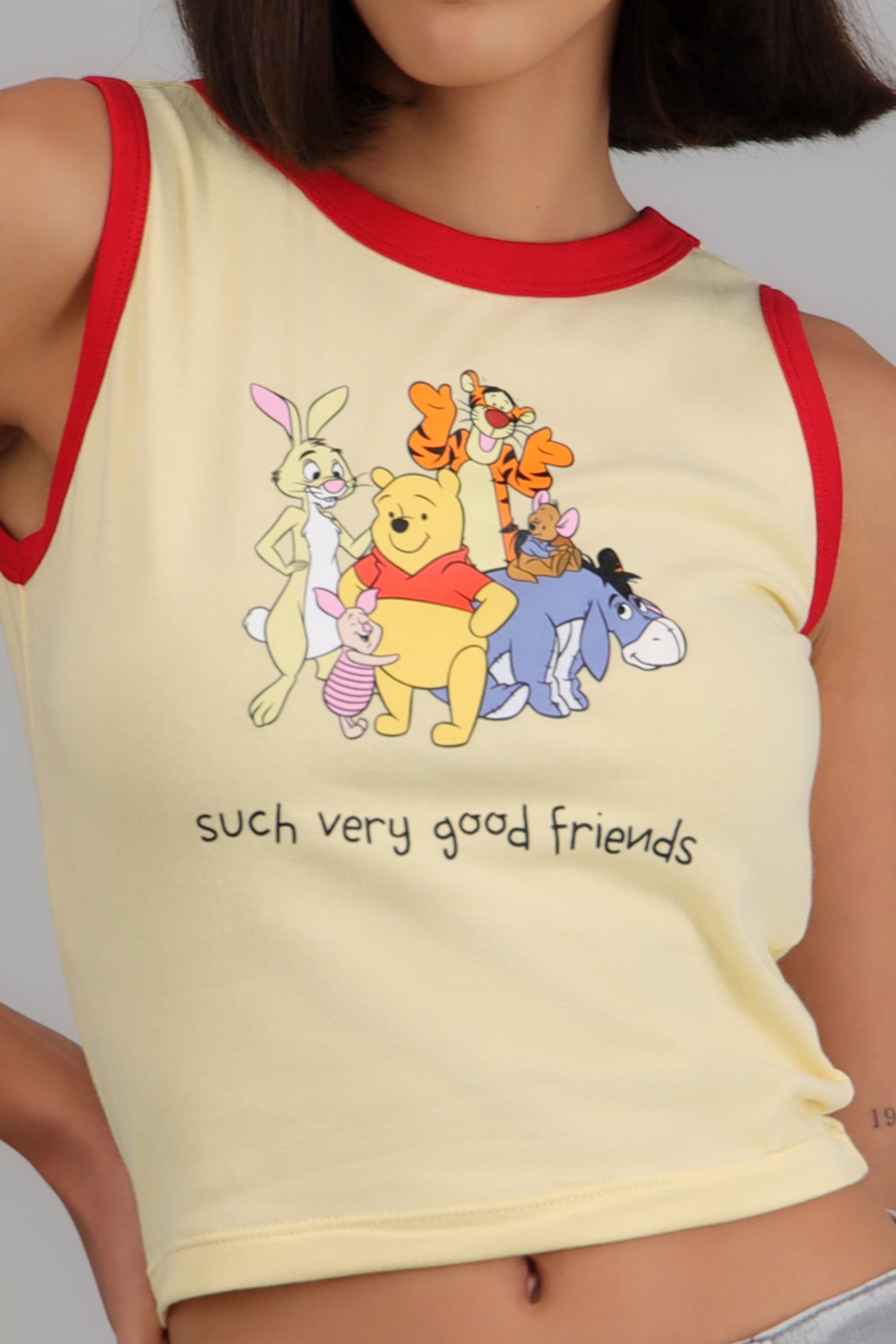Crop sin manga Winnie Pooh AMARILLO PASTEL