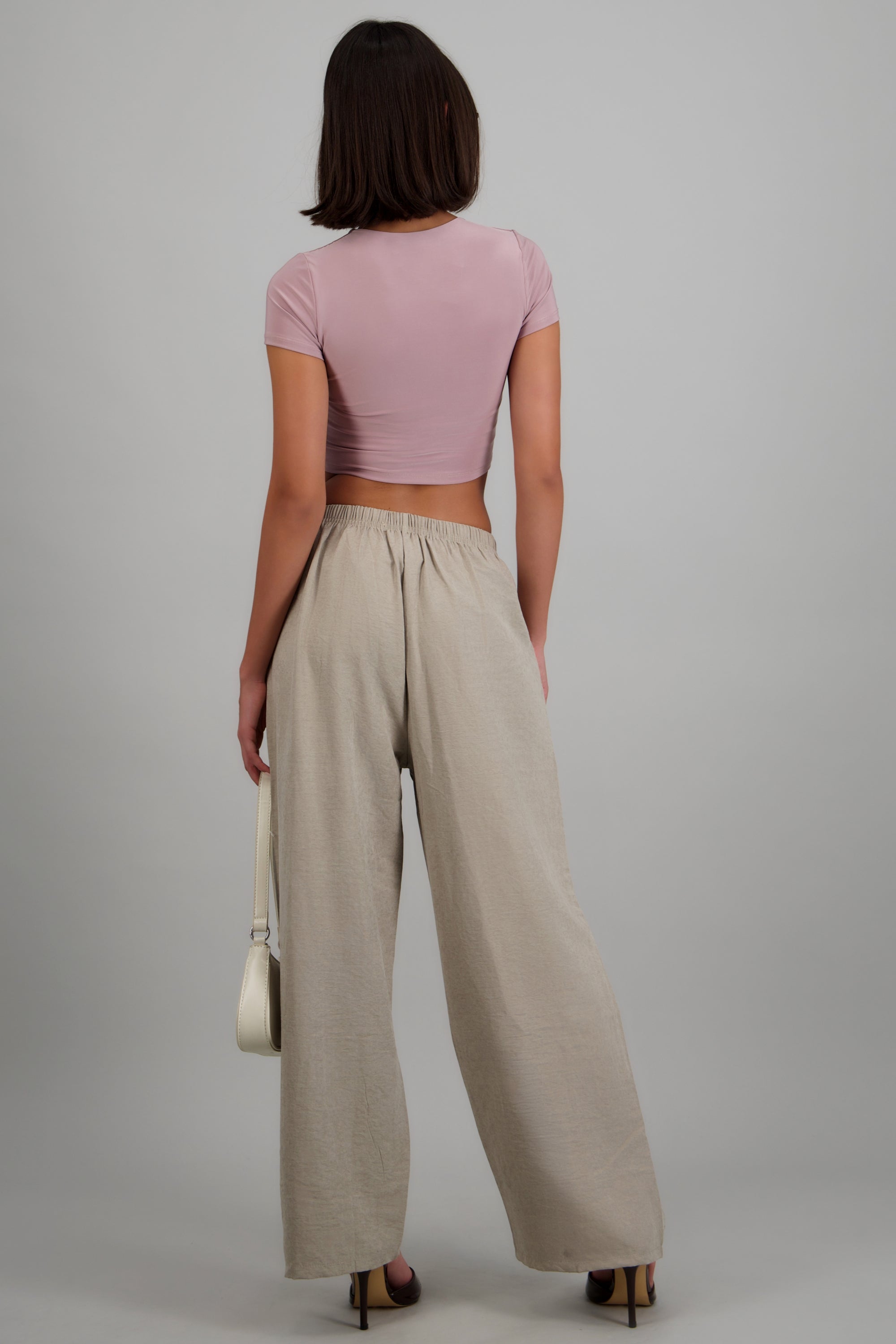 Pantolón liso bolsas BEIGE