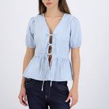 Blusa manga corta detalle moños