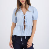 Blusa manga corta detalle moños