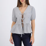Blusa manga corta detalle moños