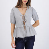 Blusa manga corta detalle moños