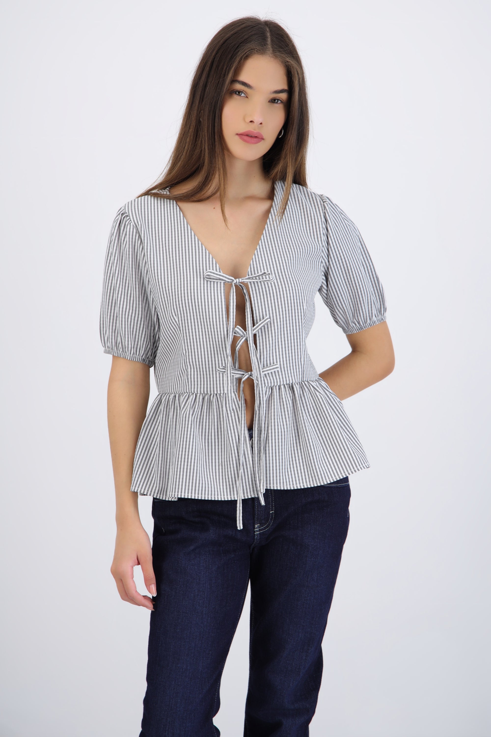 Blusa manga corta detalle moños