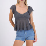 Blusa manga corta detalle escote