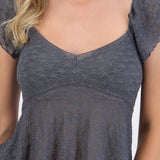 Blusa manga corta detalle escote