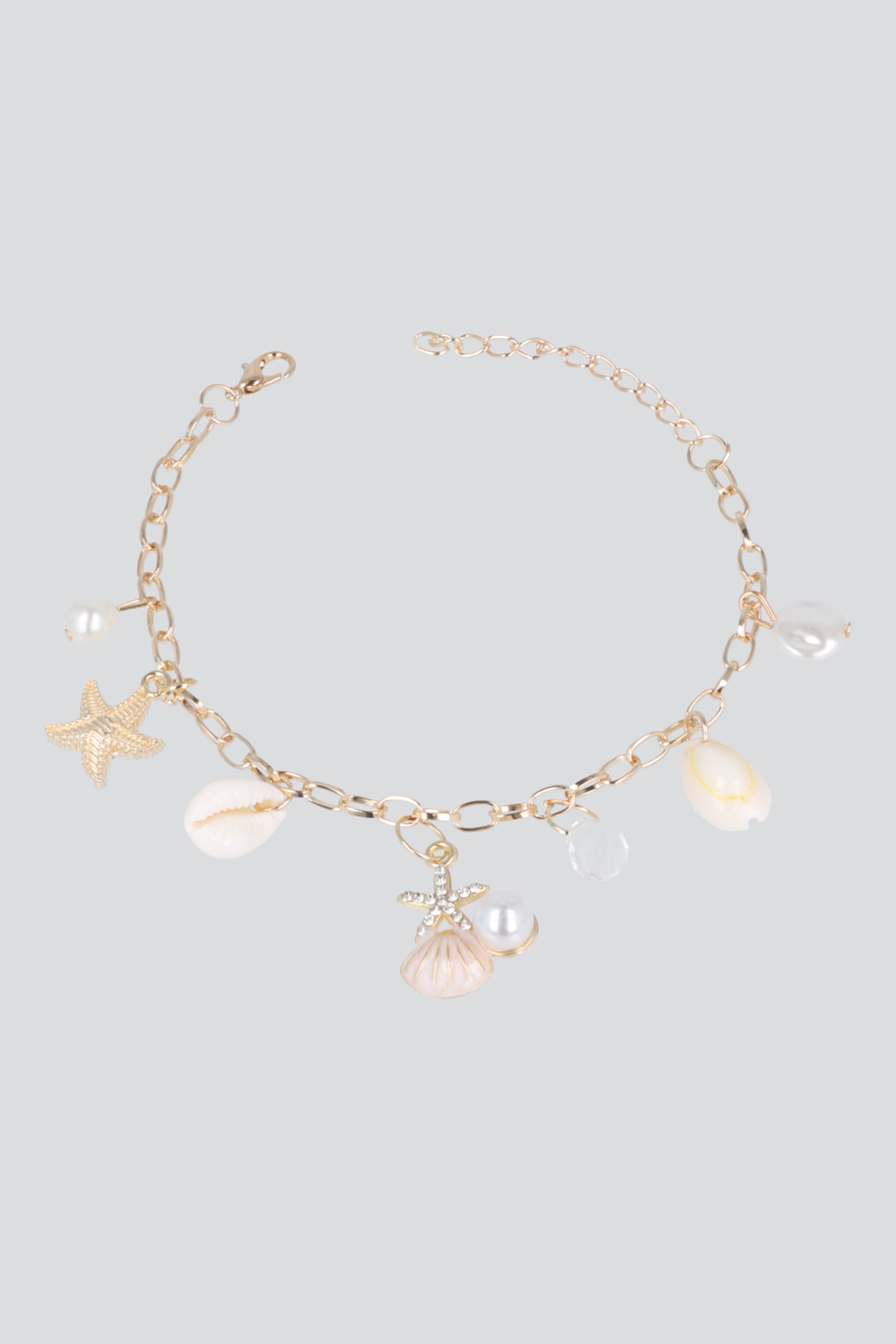 PULSERA CHARMS MAR ORO