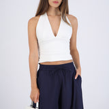 Top halter liso con pliegues