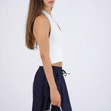 Top halter liso con pliegues