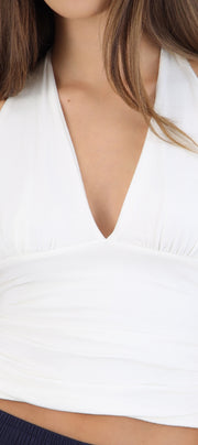 Top halter liso con pliegues