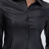 Blusa PU manga larga lisa