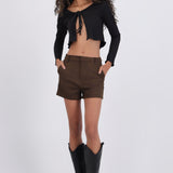 Shorts suede con bolsas