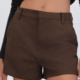 Shorts suede con bolsas