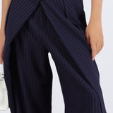 Pantalón vestir detalle cruzado