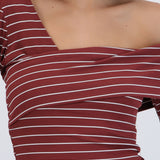 Top asimetrico off shoulder manga larga rayas