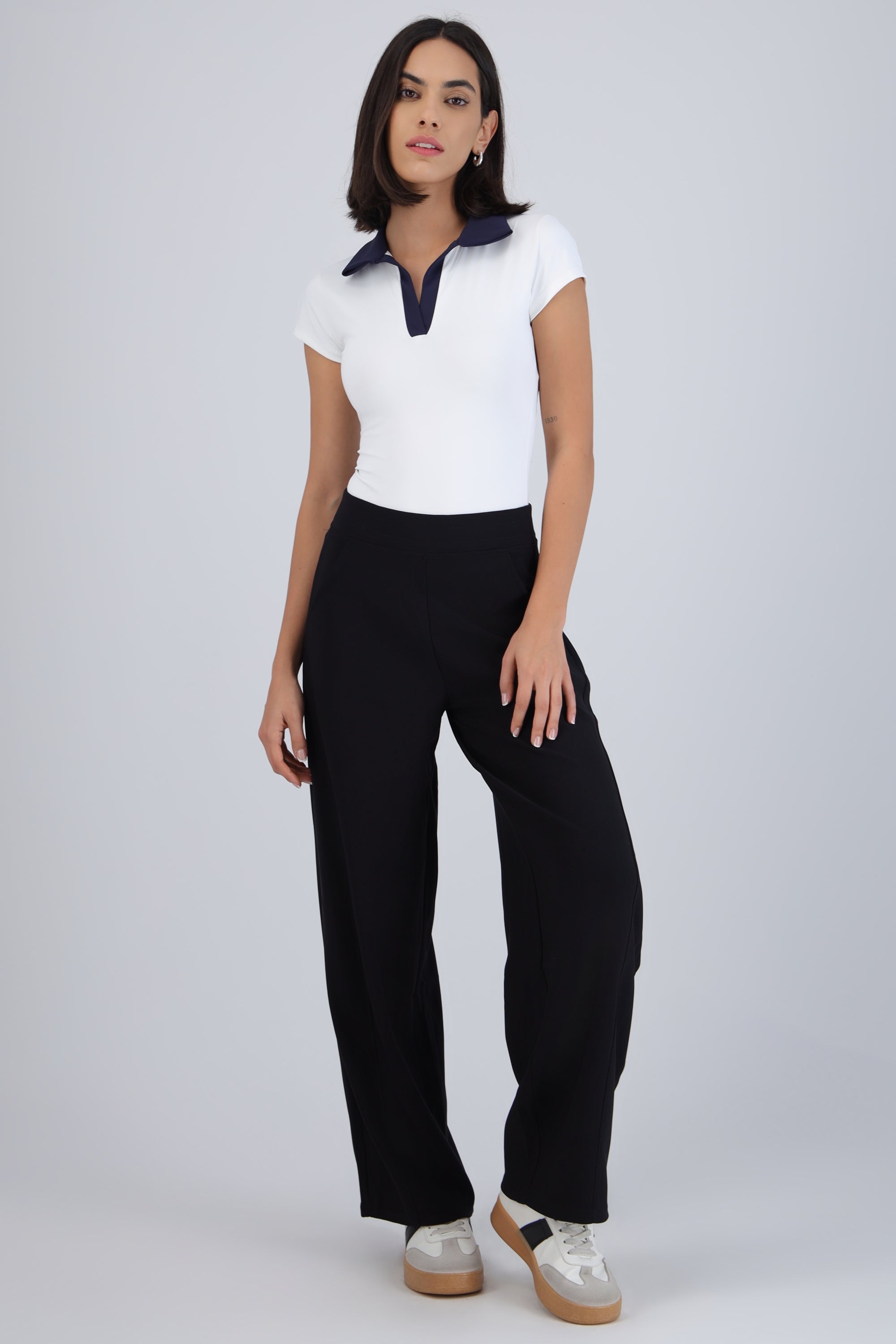 Pantalón barrel con bolsas