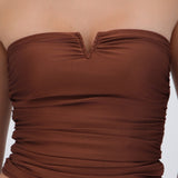 Top drapeado strapless