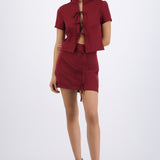 Falda mini con short detalle lazos