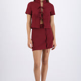 Falda mini con short detalle lazos