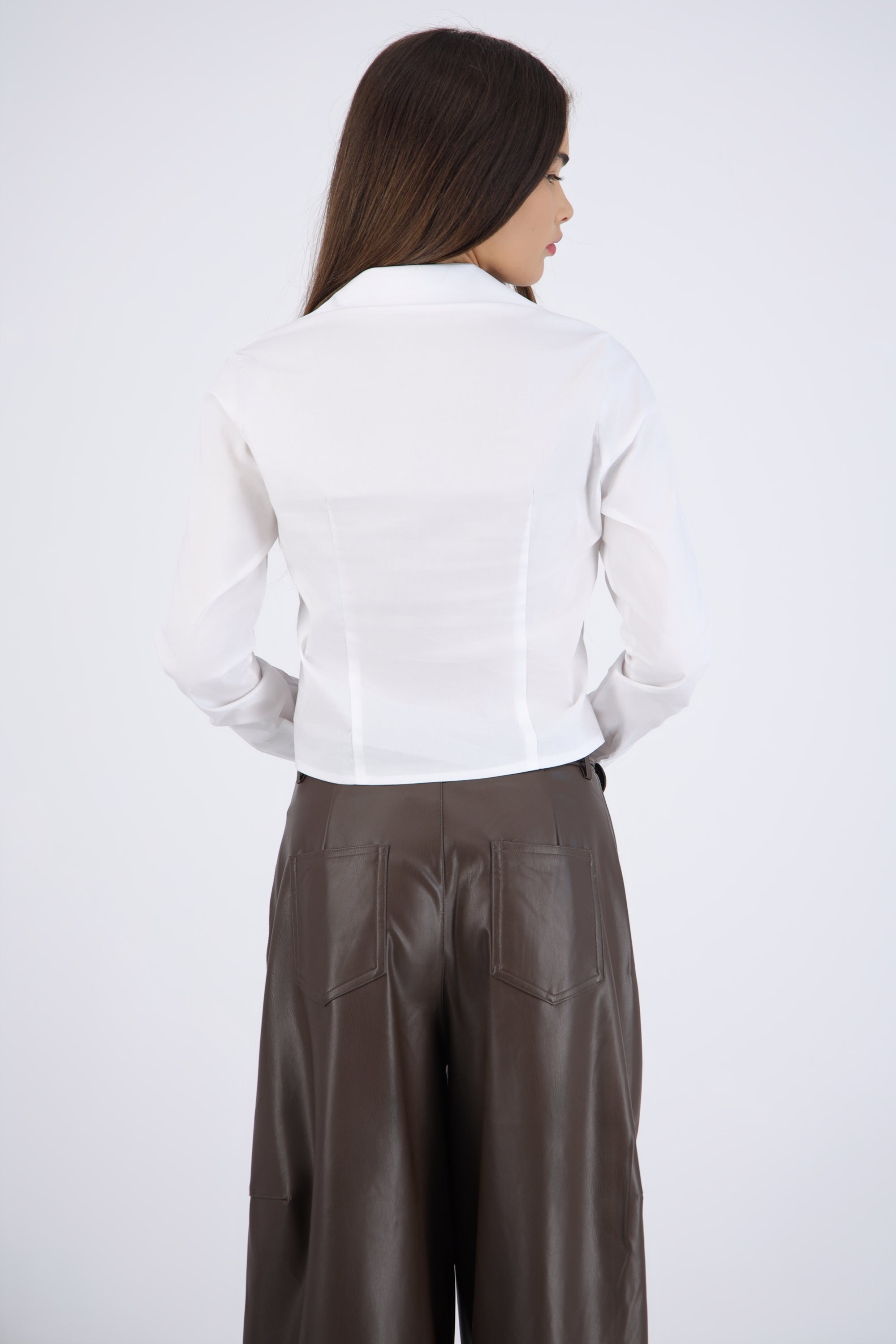 Camisa manga larga detalle cortes en cintura