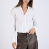 Camisa manga larga detalle cortes en cintura