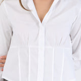 Camisa manga larga detalle cortes en cintura