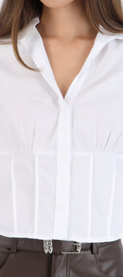 Camisa manga larga detalle cortes en cintura