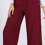 Pantalón amplio detalle cinturón mini
