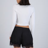 Top manga larga rib detalle botones
