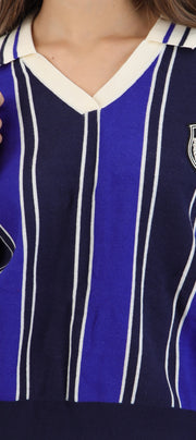 Suéter cuello polo detalle escudo