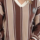 Suéter cuello polo detalle escudo