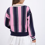 Suéter cuello polo detalle escudo