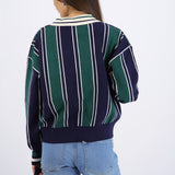 Suéter cuello polo detalle escudo